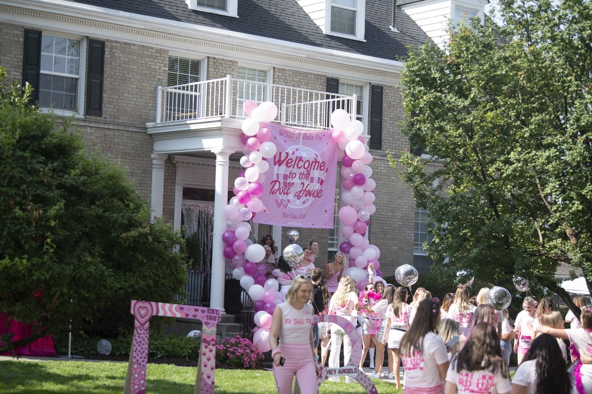 With decorations and pounding music in the air, the Pi Beta Phi sorority house welcomes new members Sunday, Aug. 22, 2021 after "bid day", where sorority new members find out which house they will join, then sprint from campus to their designated houses.  (JESSE TINSLEY)