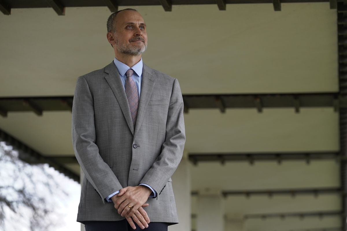 Kenneth Trzaska, President of Lewis &amp; Clark Community College, poses for a photo on the college's campus Dec. 15, 2021, in Godfrey, Ill. The small Illinois school canceled classes for days after a ransomware attack last month that knocked critical computer systems offline.  (Jeff Roberson)