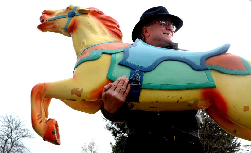 A horse from the former Playland Pier carousel in Coeur d’Alene is shown by Richard Le Francis, former president of the Coeur d’Alene Carousel Foundation, in this March 7, 2011, photo. (Kathy Plonka / The Spokesman-Review)