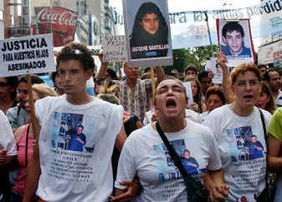 Supporters of victims of a nightclub fire that killed 183 people march in Buenos Aires on Monday.
(Associated Press / The Spokesman-Review)