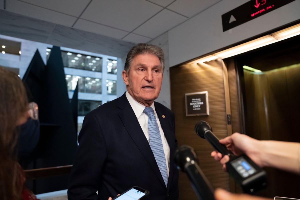 Sen. Joe Manchin, D-W.Va., leaves his office after speaking with President Joe Biden about his long-stalled domestic agenda, on Dec. 13 at the Capitol in Washington, D.C.  (J. Scott Applewhite)