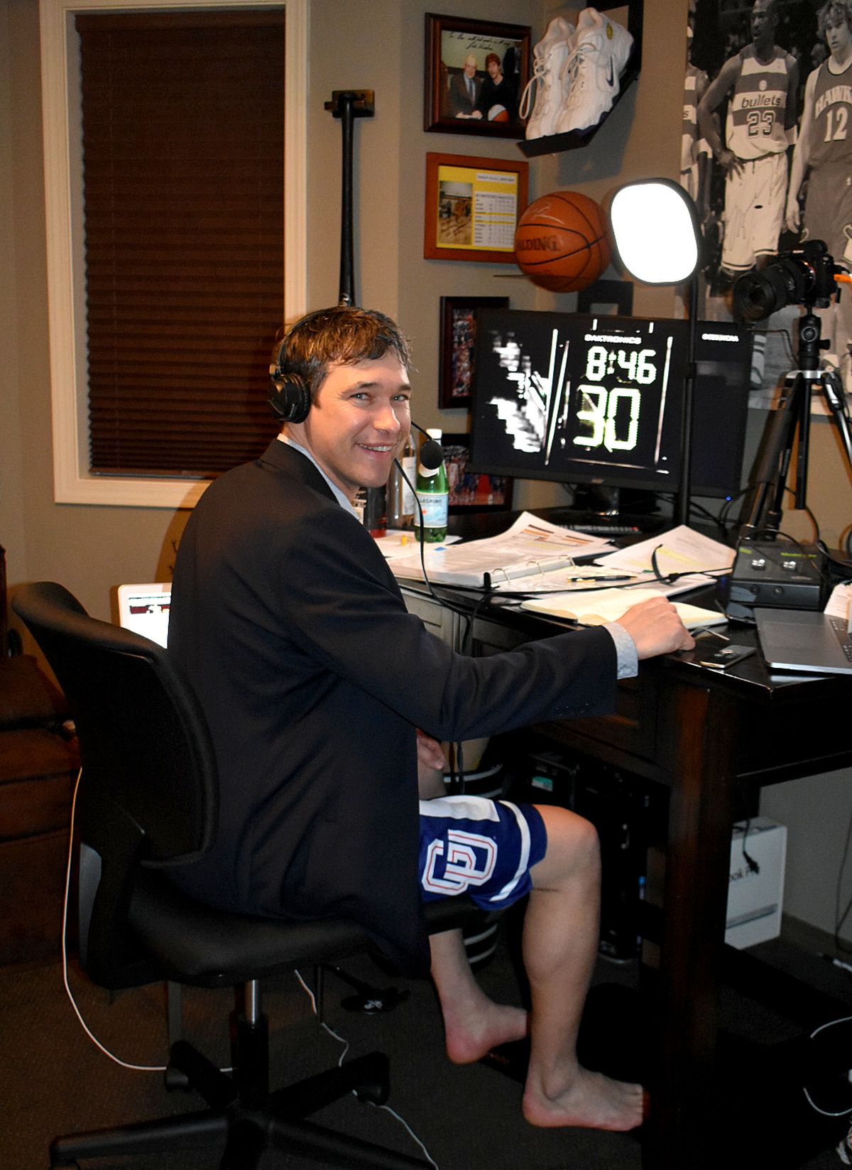 A comfortably dressed Dan Dickau broadcasts the Southern Illinois at Loyola-Chicago game in Chicago on Friday from his home office in Colbert for the CBS Sports Network.  (Heather Dickau)