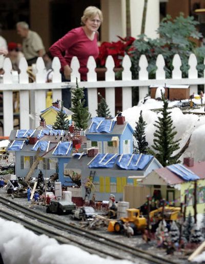 
A Christmas display of homes with blue tarps and debris – depicting a hurricane-damaged community – has sparked strong feelings in Metairie, La. 
 (File/Associated Press / The Spokesman-Review)