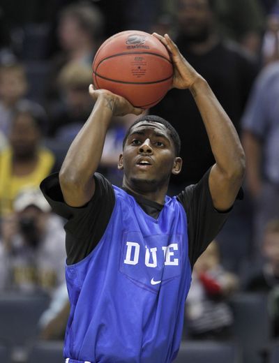 Duke's Kyrie Irving takes a shot during practice before an NCAA West regional tournament game. (Associated Press)