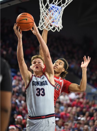 Gonzaga's Ben Gregg grabs for a rebound against Northern Illinois' Antony Crump (50) in the second half of the non-conference game at McCathey Athletic Center at Gonzaga University in Spokane, Washington.  (Jesse Tinsley/THE SPOKESMAN-REVIEW)