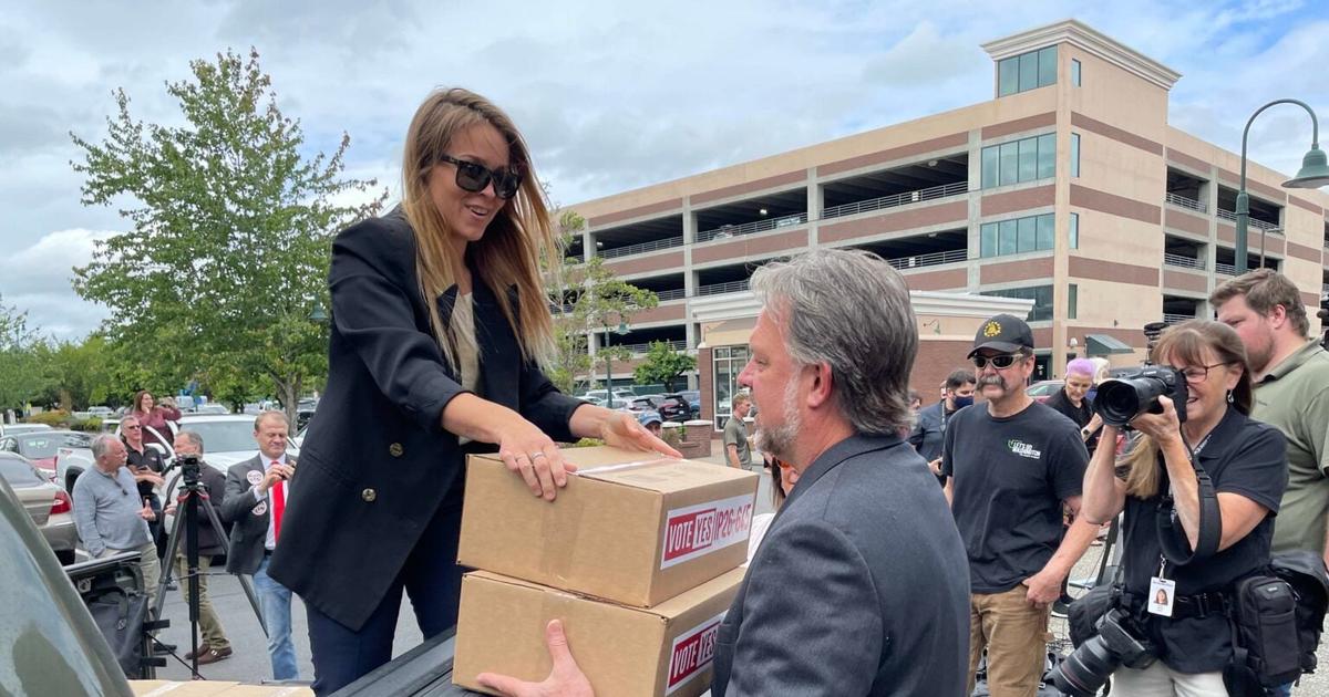 WA income tax foes file signatures to get repeal measure on ballot