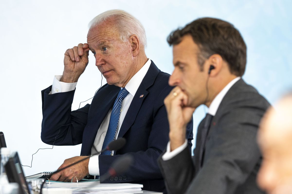 President Joe Biden talks with French President Emmanuel Macron during the final session of the G-7 summit in Carbis Bay, England, Sunday, June 13, 2021.  (Doug Mills)