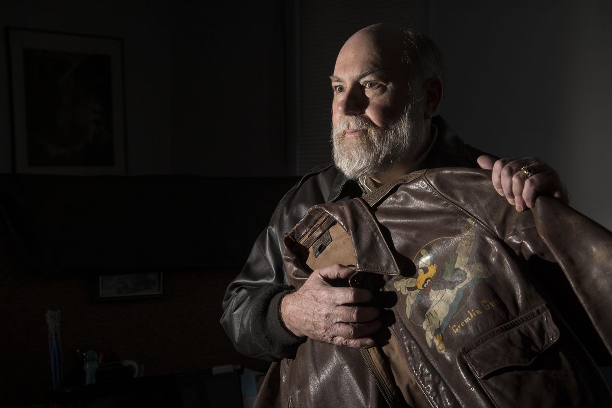 Greg Staples holds his father’s vintage flight jacket in his north Spokane office on Dec. 16, 2016. Maj. Donald Staples died in a B-52 crash on Sept. 8, 1958, near Fairchild Air Force Base. (Dan Pelle / The Spokesman-Review)