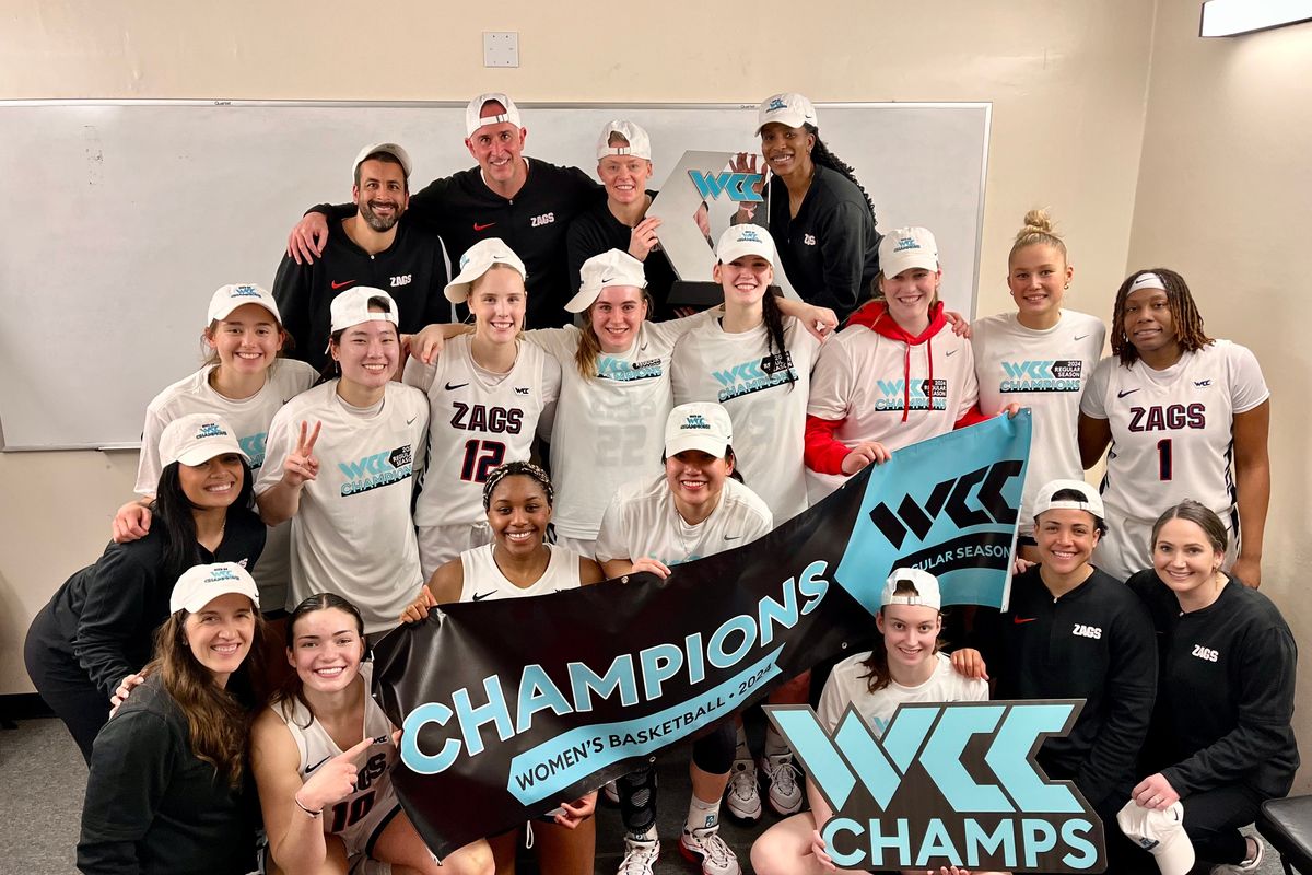The Gonzaga women’s basketball team celebrates winning the West Coast Conference championship after defeating Pacific in Stockton, California, on Saturday.  (Courtesy of Gonzaga Athletics)