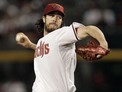 Arizona pitcher Dan Haren leads the National League in strikeouts-to-walks ratio.  (Associated Press / The Spokesman-Review)