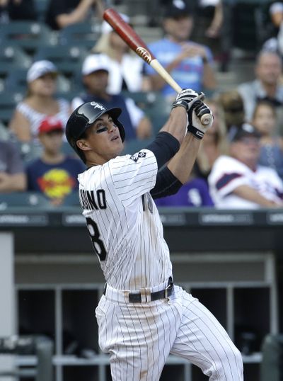 Tyler Saladino hits a game-winning single for the White Sox in the 11th inning (Associated Press)
