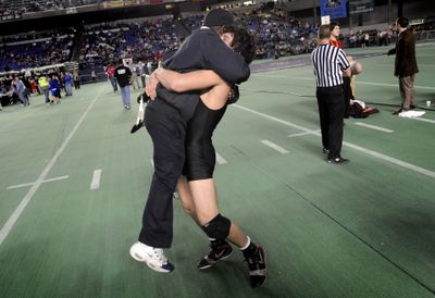 University’s Jake Mason celebrates after winning the 160-pound final. Special to  (Ingrid Barrentine Special to / The Spokesman-Review)