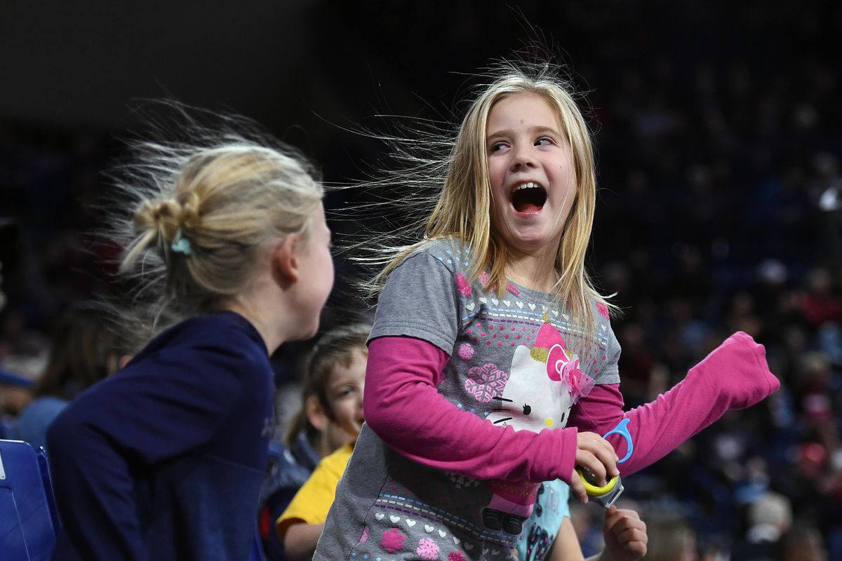 Young fans dance to "Twist and Shout" during a timeout in the second half of a NCAA college basketball game, Sat., Jan. 6, 2018, in the McCarthey Athletic Center. (Colin Mulvany / The Spokesman-Review)