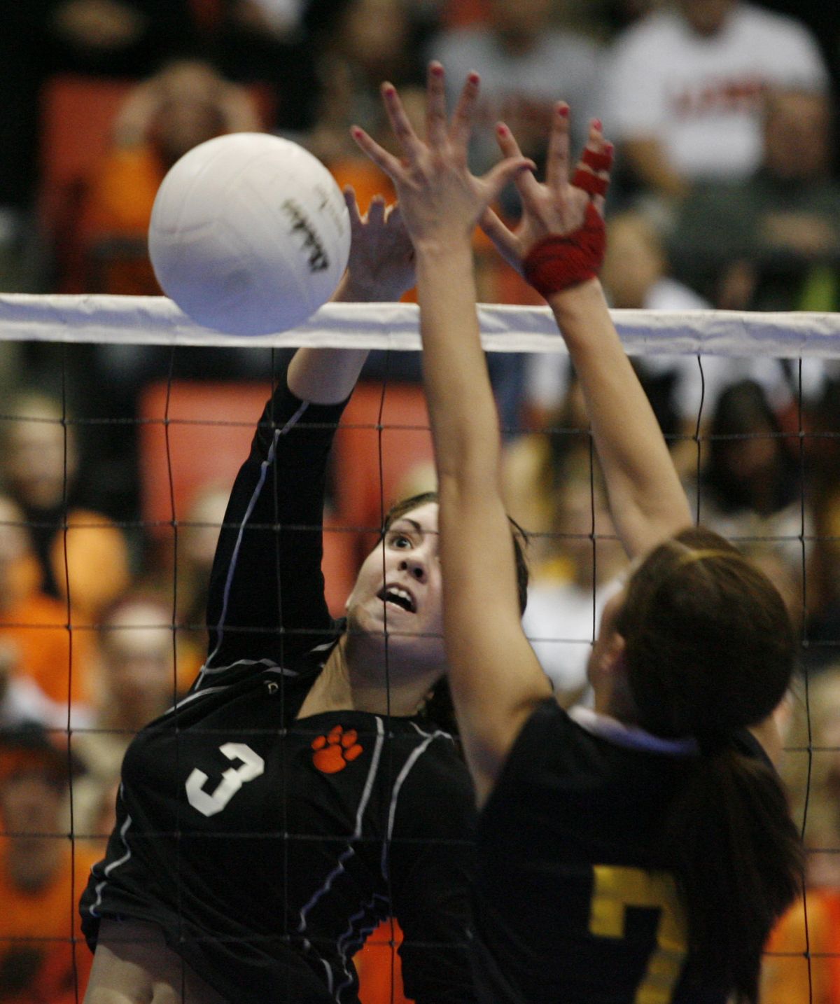 Lewis and Clark’s Janele Vogt scores a kill past Kamiakin’s Kassy Larson on Saturday. Special for  (Kai-Huei Yau Special for / The Spokesman-Review)