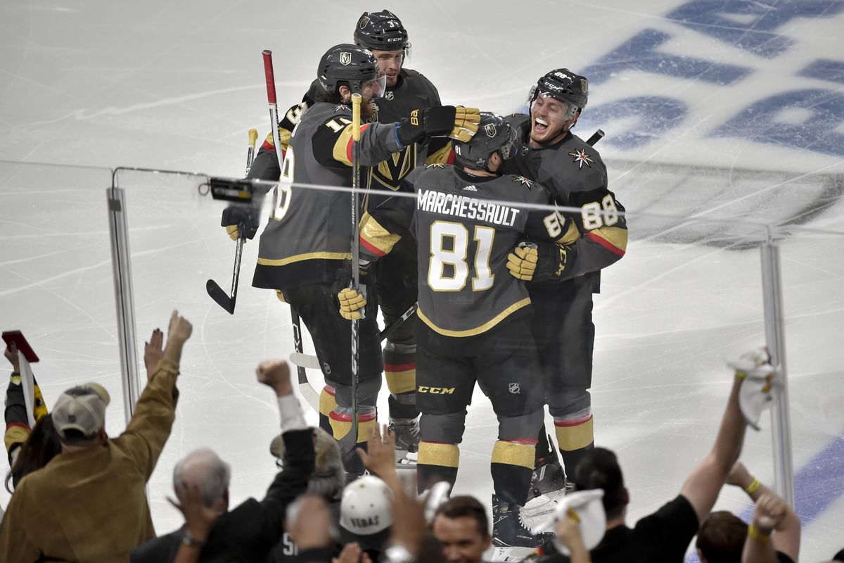 Vegas Golden Knights center Jonathan Marchessault (81) celebrates with teammates after scoring during the first period of Game 3 of the NHL Western Conference finals hockey playoffs series against the Winnipeg Jets on Wednesday, May 16, 2018, in Las Vegas. (David Becker / Associated Press)