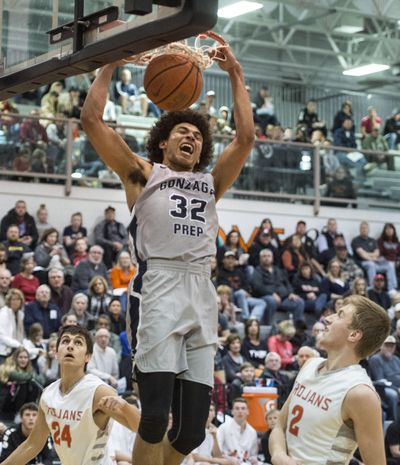 Gonzaga Prep’s Anton Watson Prep slams one down against Post Falls on Dec. 7, 2017. (Dan Pelle / The Spokesman-Review)