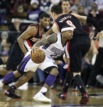 Former UW star Isaiah Thomas (22), a Kings fans favorite, knows how it feels for a city to lose its team. (Associated Press)