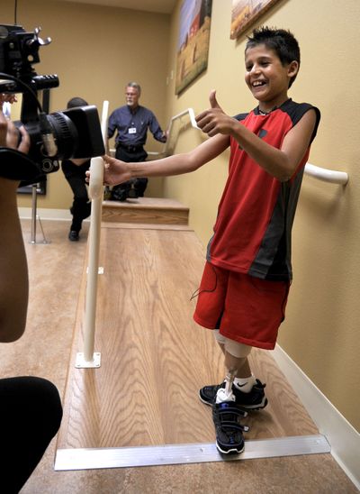Rahim gives a thumbs-up after receiving a prosthetic leg at Kootenai Prosthetics & Orthotics. (Kathy Plonka)