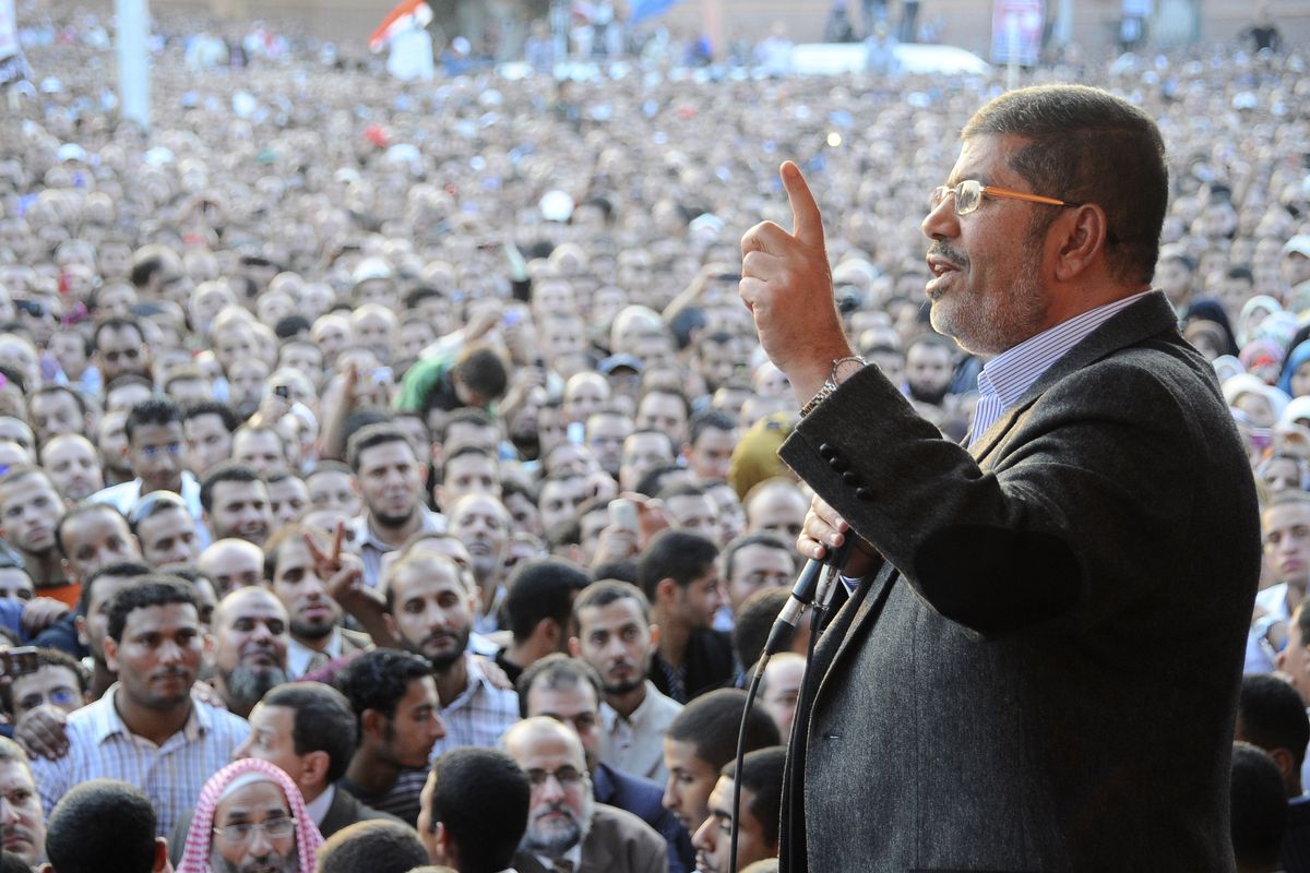 President Mohammed Morsi speaks to supporters outside the Presidential palace in Cairo. (Associated Press)