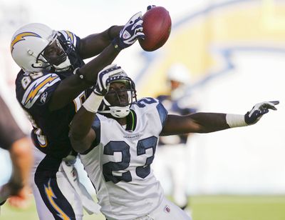 San Diego’s Chris Chambers fails to haul in a pass as Seattle’s Marcus Trufant defends during the first quarter. (Associated Press / The Spokesman-Review)