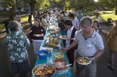 Neighbors and good food fill the 1100 block of West 9th in 2007 as part of the National Night Out Against Crime.  (CHRISTOPHER ANDERSON / The Spokesman-Review)