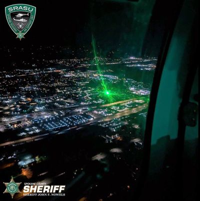 A green laser shines toward a helicopter Oct. 13 in Spokane Valley.  (Courtesy of Spokane County Sheriff's Office)