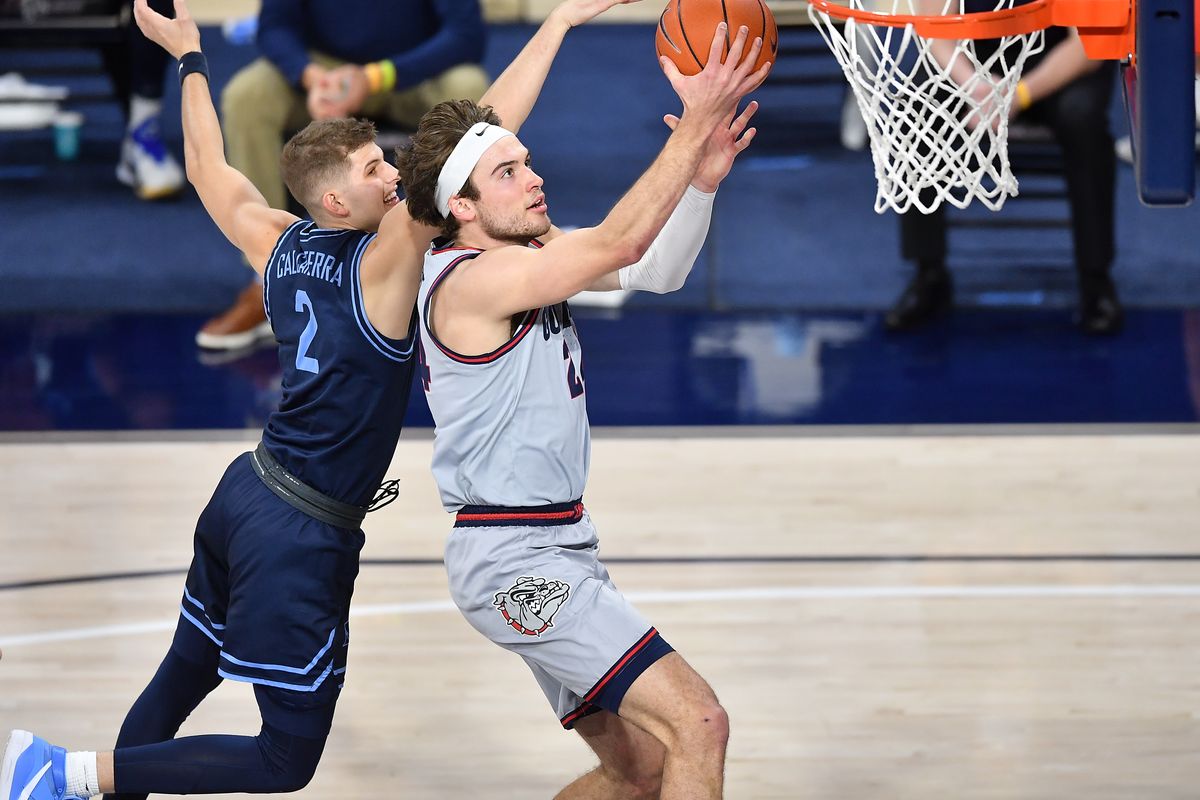 Gonzaga senior forward Corey Kispert, who scored 16 points, drives past San Diego guard Joey Calcaterra during the first half Saturday at McCarthey Athletic Center.  (Tyler Tjomsland/THE SPOKESMAN-RE)