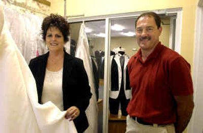 
Becky Applegate and Gene Slater recently opened their adjoining, but separate, businesses, Affordable Elegance Bridal & Rental Boutique and the Tuxedo Gallery, on Fourth Street in Coeur d'Alene. 
 (Jesse Tinsley / The Spokesman-Review)