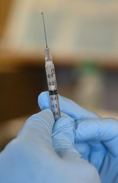 In a few years, vaccines may not be painful. Researchers at WSU are creating microneedles to deliver vaccines instead of using the larger needles that cause pain.  (COLIN MULVANY/The Spokesman-Review)