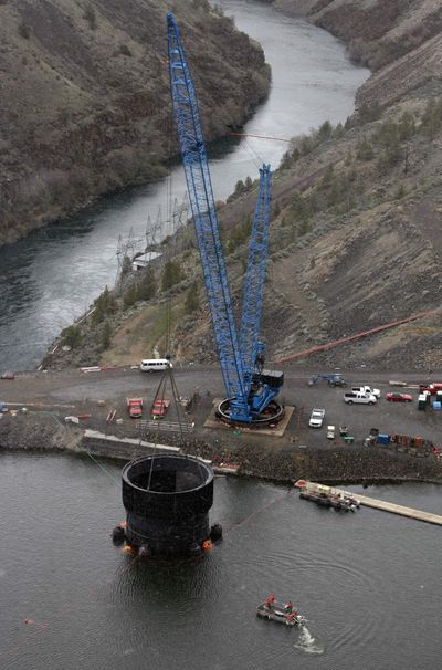 The fish and water intake tower is seen Tuesday next to the Round Butte Dam on Lake Billy Chinook upstream from the Deschutes River, near Culver, Ore. Damage to the $110 million project to restore salmon and steelhead runs will likely take at least four months to repair.  (Associated Press / The Spokesman-Review)