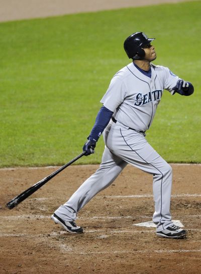 Ken Griffey Jr. hits sacrifice fly on Wednesday night.  (Associated Press)