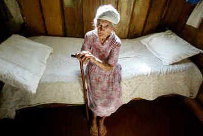 
Maria Olivia da Silva, 125, poses for a portrait at her home in Astorga, in the Brazilian state of Parana, on Feb. 10. She was born on Feb. 28, 1880. 
 (Associated Press / The Spokesman-Review)