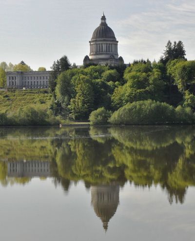 The Washington Capitol dome reflected in Capitol Lake on a calm day in Olympia. (Jim Camden/The Spokesman-Review)