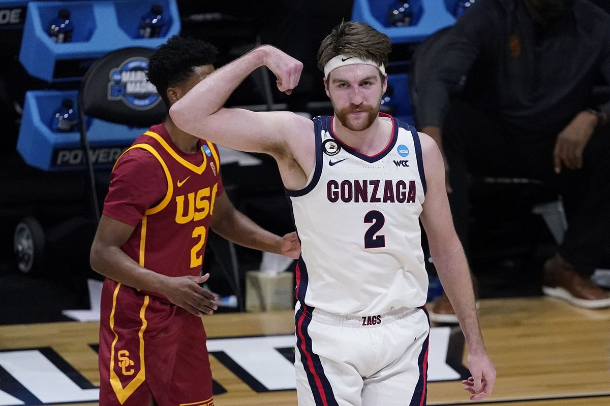 Gonzaga forward Drew Timme, right, celebrates a basket against USC in an Elite Eight game in the NCAA Tournament in Indianapolis on March 30.  (Darron Cummings/Associated Press)