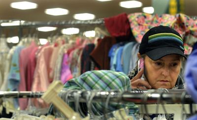 “My tips are down 50 percent from eight years ago,” said Wilma Millick, of Spokane, as she shopped at Northwest Christian Schools Thrift Store in Spokane on Monday. She is a bartender and waitress who likes to scour  thrift shops for “treasures.”  (Kathy Plonka / The Spokesman-Review)