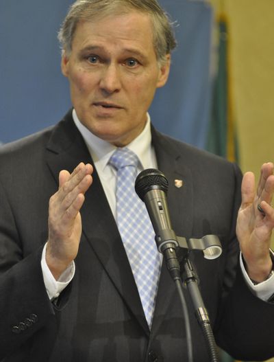 OLYMPIA -- Gov. Jay Inslee says there's still a gap between Democrats and Republicans in the Legislature over a transportation package. (Jim Camden)