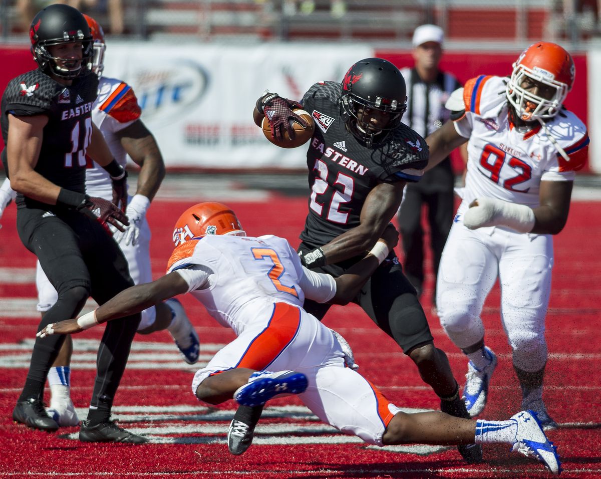 Eastern Washington running back Quincy Forte sidesteps Sam Houston State’s Michael Wade. Forte finished with 152 yards on the ground Saturday. (COLIN MULVANY PHOTOS)