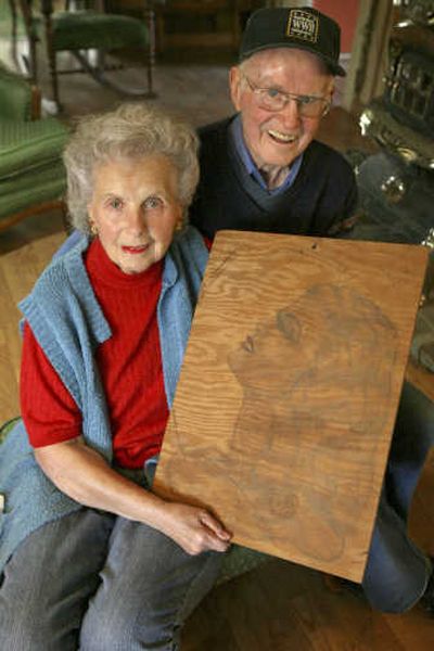 
Bill and Norma Cahill, both 85, pose Thursday with a drawing Norma made for Bill in 1938 that they recently rediscovered. Associated Press
 (Associated Press / The Spokesman-Review)