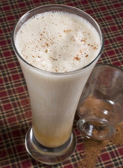 Colonial-era coach drivers found this smooth flannel eggnog the right thing for those cold days and nights.  (Associated Press)