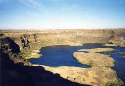 
Dry Falls, near Grand Coulee and Sun Lakes State Park in central Washington state, once was cascading with water that helped carve out  parts of the  state thousands of years ago. 
 (Associated Press / The Spokesman-Review)
