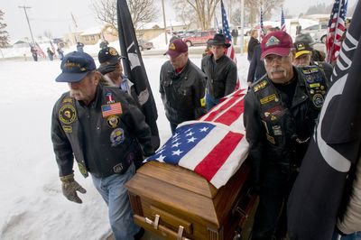 At the Church of Jesus Christ of Latter-day Saints in Colville Friday, members of the Patriot Guard act as pallbearers at the funeral of Army Chief Warrant Officer Benjamin Todd, who died Jan. 26 in an Army helicopter crash in  Iraq.  (Colin Mulvany / The Spokesman-Review)