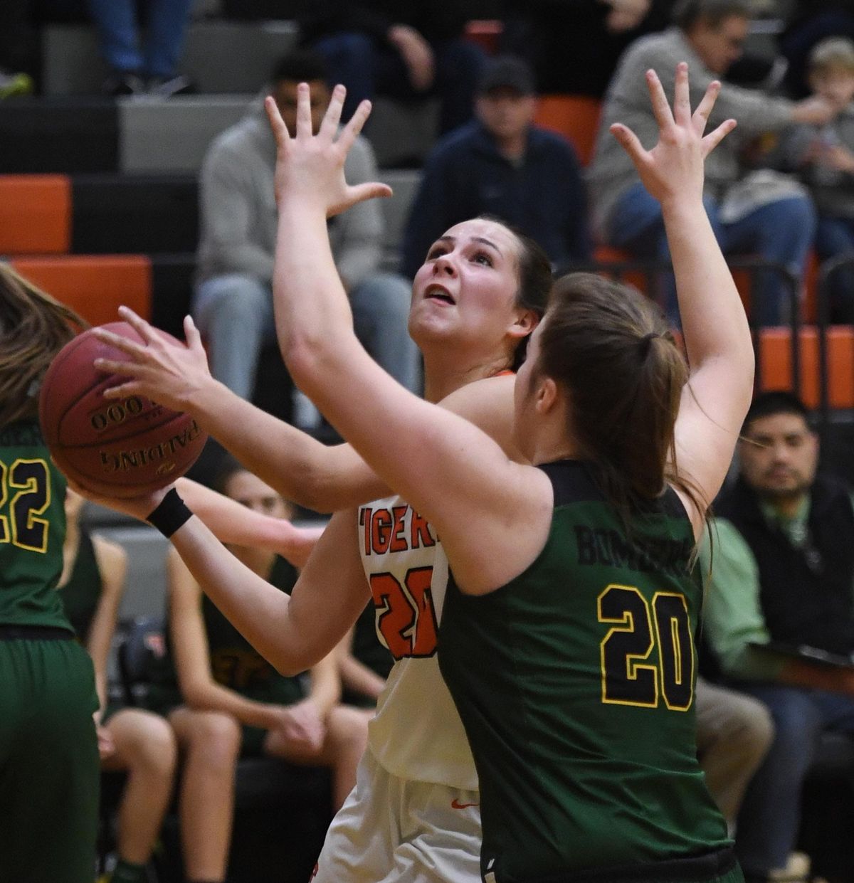 Lewis and Clark senior guard Dominique Arquette (20) eyes the basket as Richland’s Halee Pierce defends during a District 8 first round high school basketball game on Feb. 6, 2019, at Lewis and Clark High School. (Colin Mulvany / The Spokesman-Review)
