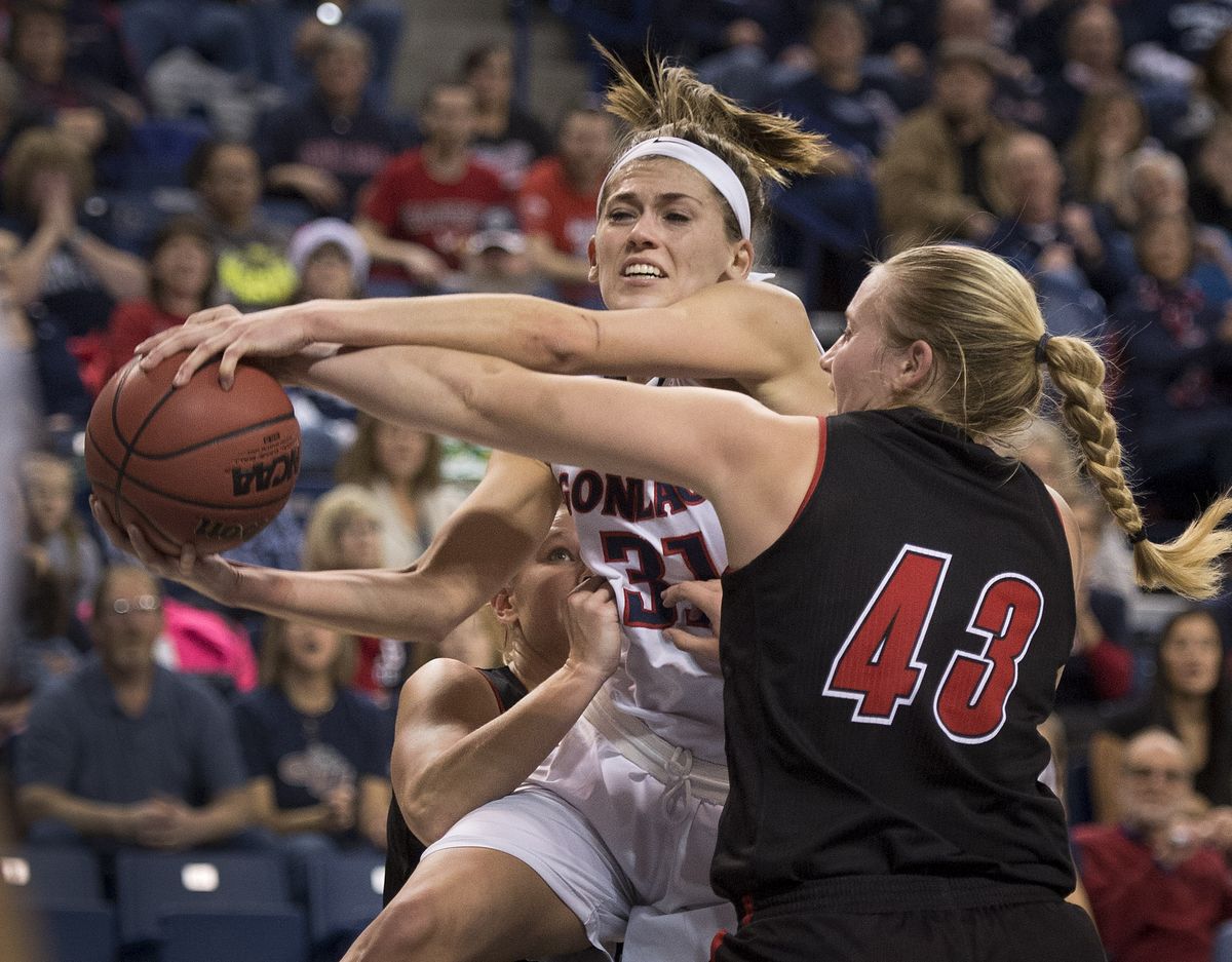 Gonzaga’s Elle Tinkle and Southern Utah’s Jessica Richardson battle for the ball during the first half of the Bulldogs’ win at McCarthey Athletic Center. (Colin Mulvany)