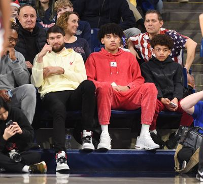 Gonzaga recruit Ilane Fibleuil took in the Bulldogs’ 120-42 win over Eastern Oregon on Wednesday next to former GU forward and fellow Frenchman Killian Tillie.  (Jesse Tinsley / The Spokesman-Review)