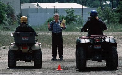 
Earl Castleberry, 70, trail coordinator for the High Mountain ATV Association, takes his turn with a class of students at the first Responsible Rider instructor certification course, which was held in late June in Wallace and sponsored by the Idaho State Parks and Recreation Department. 
 (Photos by Rich Landers/ / The Spokesman-Review)
