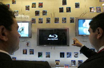 
Show attendees look at Sony's Blu-ray movie display at the Consumer Electronics Show in Las Vegas earlier this week. 
 (Associated Press / The Spokesman-Review)