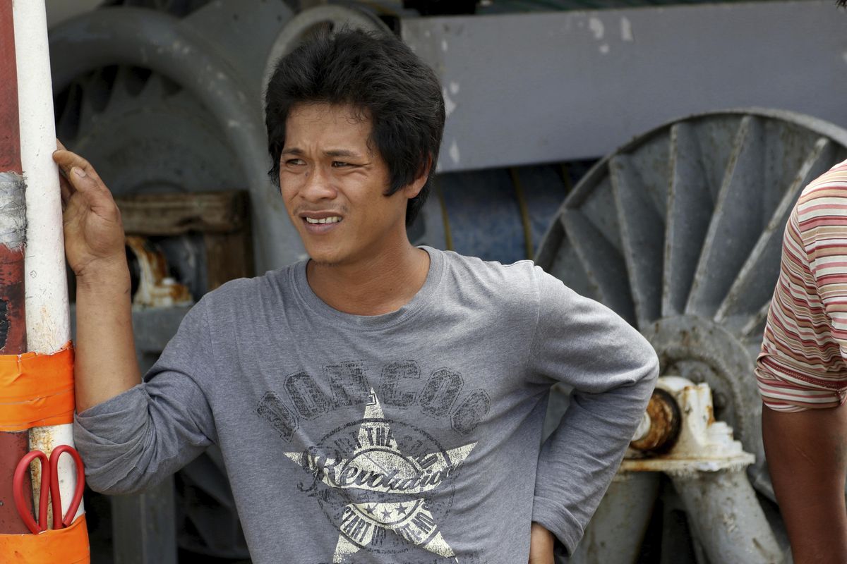 Khanh Huynh, 28, of Long Khanh district, Dong Nai province, Vietnam, stands aboard the commercial fishing vessel Commander on Thursday, March 29, 2018 in Honolulu. Huynh was about the Commander’s sister ship, the Princess Hawaii, when it sank off Hawaii’s Big Island on March 25, 2018. The Vietnamese fisherman helped save the lives of two Americans aboard the vessel as well as six other foreign workers from Vietnam and Kiribati. (Sophia Yan / Associated Press)