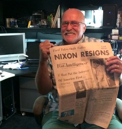 Terry Kolemaine with a copy of the P-I from the day Nixon bowed out. (Doug Clark)