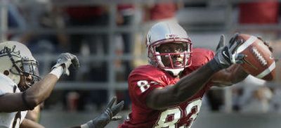 
Catches have become elusive for Washington State University senior wide receiver Jason Hill, as evidenced by this play against Idaho last Saturday. 
 (Christopher Anderson / The Spokesman-Review)