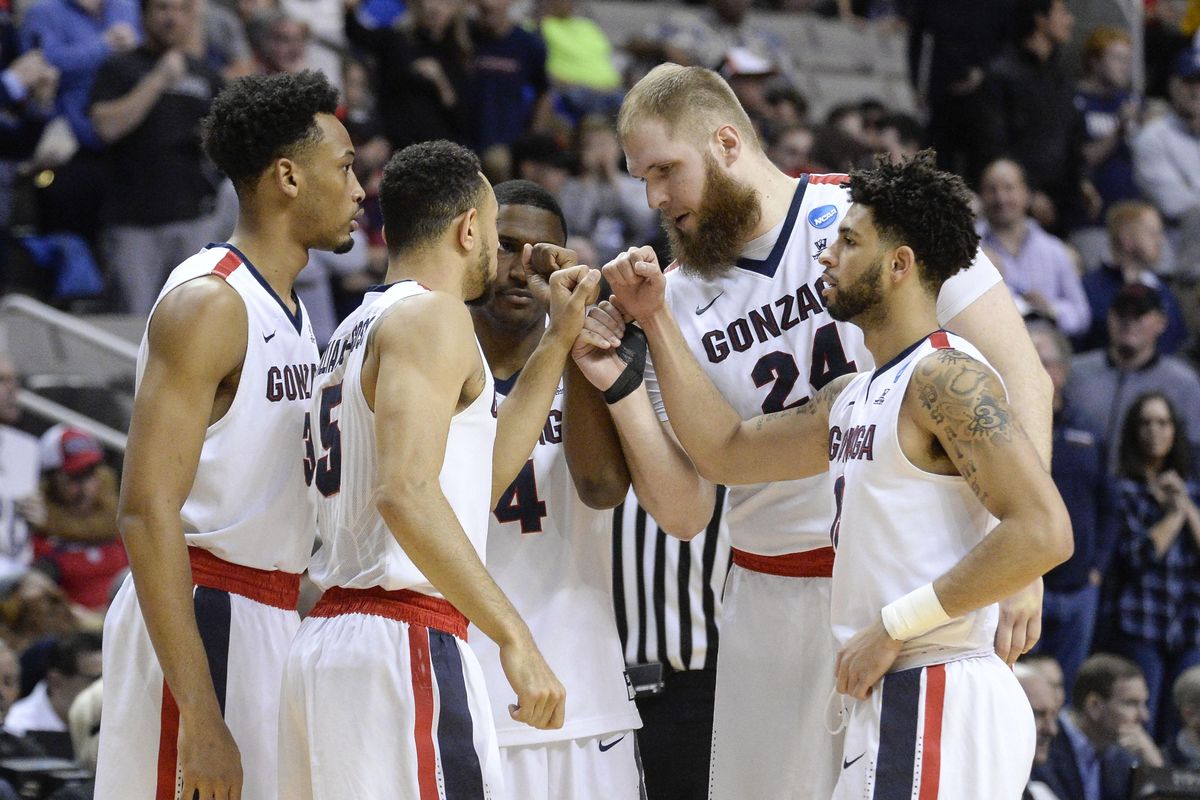 Gonzaga players gather and bump fists before taking on Xavier in an NCAA Elite Eight game, Sat., March 25, 2017, in San Jose. (Dan Pelle / The Spokesman-Review)